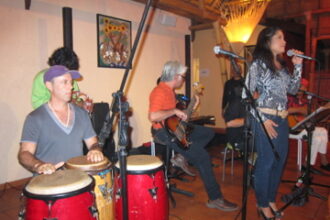Playing congas with the band